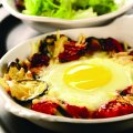 Baked eggs with courgette & tomatoes