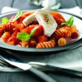 Roasted squash, sweet potato & pepper pasta with melting goat’s cheese