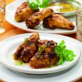Balti spiced chicken wings with zingy lime drizzle