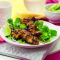 Seared chicken skewers with mixed leaves