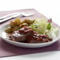 Medallions of beef with red wine & roast garlic sauce