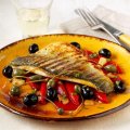 Pan-fried sea bass with Spanish olives, piquillo peppers and dry Sherry wine