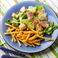 Eighties homemade thin chips with Caesar salad