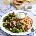 Summer garden salad of beetroot, radish & leaves with smoked trout fillets