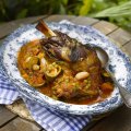 Braised shoulder of lamb with fresh peas, butterbeans & white wine