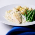Tom Aikens pan-fried sea bass with a herby butter sauce