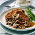 Oat coated pork with spicy mushroom sauce