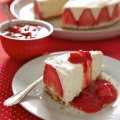 Strawberries & vanilla cheesecake, with a warm strawberry compote