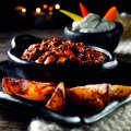 Mexican chilli bowl with crispy jacket wedges