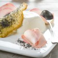 Rose pannacotta with poppy seed tuile