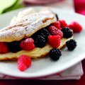 Souffle omelette with quark cream, blackberries and raspberries