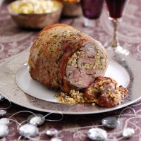 Roast boneless shoulder of lamb with lemon, caper & anchovy stuffing