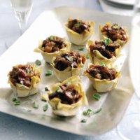 Beef, olive & red onion canapés
