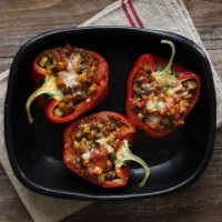 Stuffed red peppers with garden vegetables
