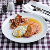 Beetroot pancakes with eggs & smoked bacon