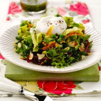 Summer leafy salad with salsa verde dressing