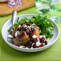 Baked potato filled with traditional beetroot, feta & mint salad