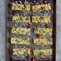 Cherry energy bars with white chocolate drizzle