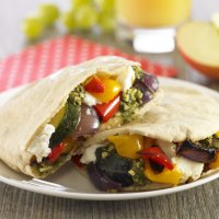 Mediterranean vegetables, mozzarella & pesto pittas