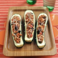 Tomato & almond-stuffed courgettes