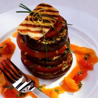 Griddled aubergine stacks with tomato confetti sauce