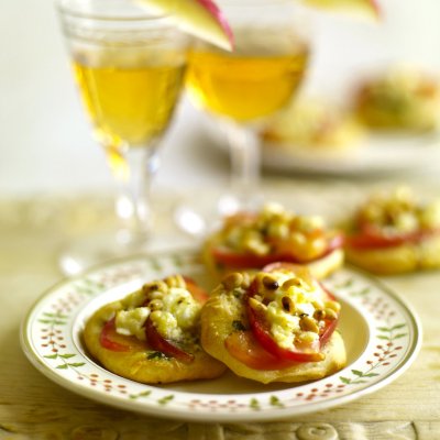 Apple, feta & pine nut pizzas