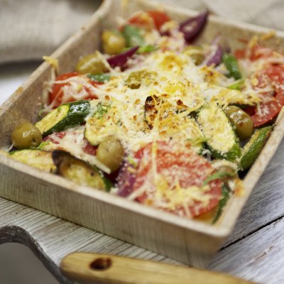 Courgette, tarragon, tomato & reduced fat cheese gratin