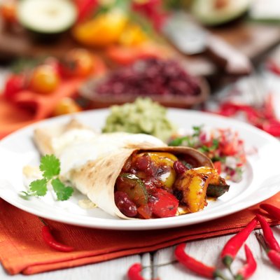 Pepper & courgette burritos with salsa & guacamole