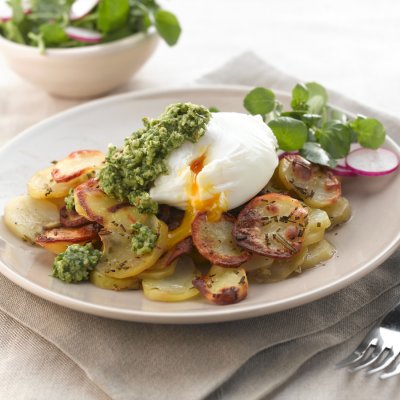 Pommes Anna with eggs, rocket & walnut pesto